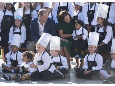 The Duke and Duchess of Cambridge pose for a photo with young chefs during the taste of British Columbia event at Mission Hill Winery in Kelowna, B.C., Tuesday, Sept 27, 2016.