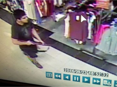 This Friday, Sept. 23, 2016 frame from surveillance video provided by the Washington State Patrol shows the suspect in a shooting rampage at the Cascade Mall in Burlington, Wash.