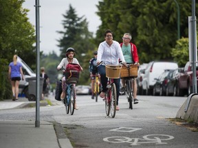 Cyclists along Point Grey Road in Vancouver. A new Vancouver Foundation study shows over half British Columbians think a newcomer would feel unwelcome in their neighbourhood.