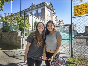 VANCOUVER, BC - SEPTEMBER 13, 2016,  -  Grade 10 students, Chloe Vincent (left) and Shea Henry outside Britannia School in Vancouver, BC., September 13, 2016.  These students would be happier staying at Brit school instead of being shuffled around to other schools. For school closure story.   (Arlen Redekop / PNG photo) (story by Stephanie Ip) [PNG Merlin Archive]