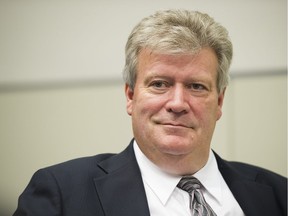 File: Minister Rich Coleman talks to the Vancouver Sun's Derrik Penner during a break at the 2015 International LNG in BC Conference, Vancouver. October 14 2015.