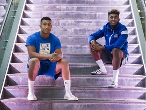 UBC Thunderbird football player Trey Levy ( L ) chats with Reese White with the AMS safe walk program, Vancouver, September 16 2016.