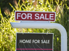 A real estate Sale for sign in front of a house in Vancouver's eastside, Vancouver, September 17 2016.