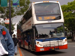 A doubledecker bus in downtown Victoria.