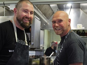 Chefs Nick Nutting of Tofino's Wolf in the Fog, left, and Todd Perrin from Newfoundland's Mallard Cottage cook up a harvest storm.