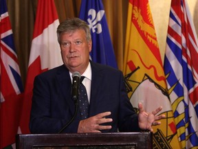 Deputy premier and B.C. Housing Minister Rich Coleman speaks to media after a federal-provincial housing meeting in Victoria on June 28, 2016.