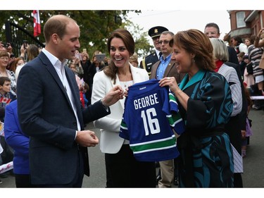 Catherine, Duchess of Cambridge and Prince William Duke of Cambridge is presented with personalised sports shirts for Prince George and Princess Charlotte by BC Premier Christy Clark at Cridge Centre for the Family on the final day of their Royal Tour of Canada on October 1, 2016 in Victoria, Canada. The Royal couple along with their Children Prince George of Cambridge and Princess Charlotte are visiting Canada as part of an eight day visit to the country taking in areas such as Bella Bella, Whitehorse and Kelowna