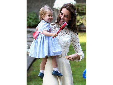 Catherine, Duchess of Cambridge and Princess Charlotte of Cambridge at a children's party for Military families during the Royal Tour of Canada on September 29, 2016 in Carcross, Canada. Prince William, Duke of Cambridge, Catherine, Duchess of Cambridge, Prince George and Princess Charlotte are visiting Canada as part of an eight day visit to the country taking in areas such as Bella Bella, Whitehorse and Kelowna