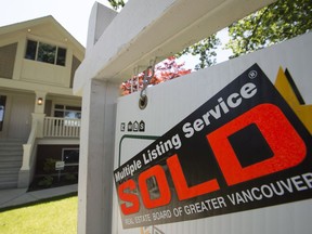 The CMHC report said it couldn't predict any long-term or mid-term effect on Vancouver's real estate market of the city's 15-per-cent tax on foreign buyers.