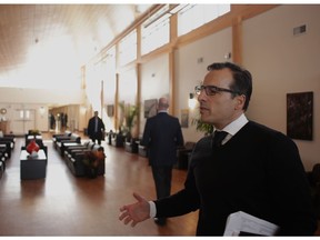 Anthony Radman, BC Hydro's project manager for the Site C workers accommodations, starts a tour of the just-completed Two Rivers Lodge in the spacious reception lounge, which features locally produced art work on the walls.