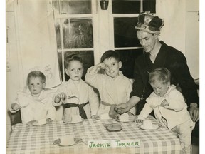 April 1949: Vancouver boxer Jackie Turner with his four kids.