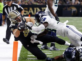 New Orleans Saints tight end Coby Fleener (82) is stopped at the goal line in the second half of an NFL football game against the Seattle Seahawks in New Orleans, Sunday, Oct. 30, 2016.