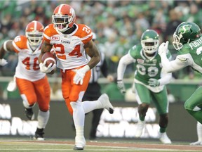 B.C. Lions running back Jeremiah Johnson (24) moves the ball up field against the Saskatchewan Roughriders during first half CFL action in Regina on Saturday, Oct. 29, 2016.