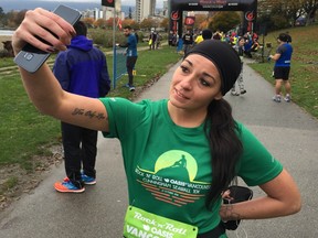 Sporting a 'You only live once tattoo,' and a competitive attitude, Noelle Benoit of North Vancouver takes a selfie before posting a 52:19 time in Saturday's Oasis Rock 'N' Roll Vancouver 10K. The half-marathon is on Sunday.