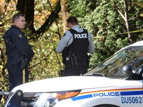 Burnaby RCMP on the scene Sunday where a body was found on North Road under the Highway 1 overpass.