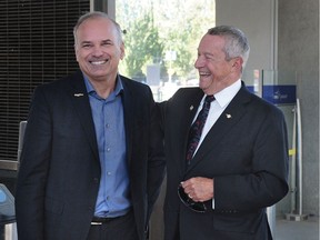 Peter Fassbender, Minister responsible for TransLink (r) with Coquitlam Mayor Richard Stewart on an "exclusive" tour of the Evergreen Line train, beginning at Burquitlam station in Coquitlam, BC., October 11, 2016.