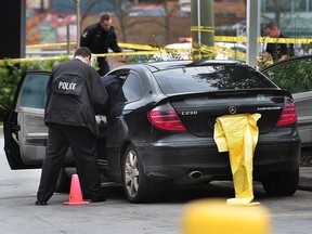 Delta Police and Surrey RCMP investigate a shooting at a car wash on Scott Road and 92nd Avenue in Delta on Monday. The victim was taken to hospital. Police are searching for suspects.