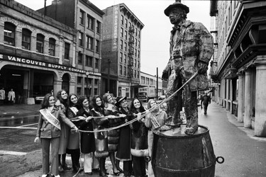 Grey Cup beauty queens at Gassy Jack statue in Gastown. November 23, 1971.