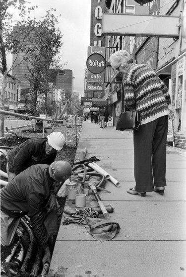 The much-debated and long-delayed construction of the new Granville Mall resumes after the resolution of an extended strike by trade unions involved in the project. July 9, 1974.