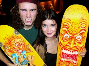 Here with fellow musician Lily Towers, Sangito Bigelow imitated skateboards he painted that raised $2,000 at an Instruments of Change benefit concert.
