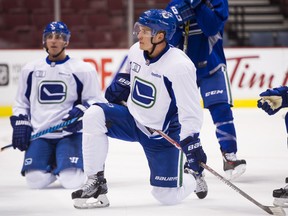 Bo Horvat listens in to the coach during team practice at Rogers Arena in Vancouver, BC, October, 13, 2016.
