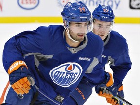 Edmonton Oilers' Jordan Eberle (14) and Connor McDavid (97) skate during training camp in Edmonton, Alta., on Tuesday September 27, 2016.