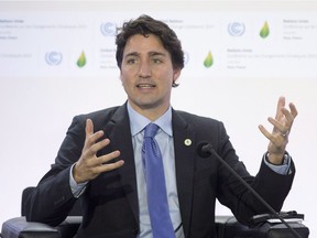 Canadian Prime Minister Justin Trudeau speaks during a session on carbon pricing at the United Nations climate change summit, Monday November 30, 2015 in Le Bourget, France.