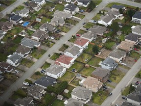 The era of the single-family house is coming to an end, according to UBC sociologist Nathanael Lauster, who says cities must diversify its housing options in order to continue growing. Pictured is an aerial view of homes in the Fraser Valley in March 2016.