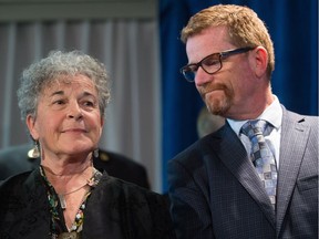 ‘I think people are starting to come around to the fact that what we have is a public-death crisis and it’s perpetrated by fentanyl, but fentanyl is really just the Big Bad Wolf,’ says Leslie McBain (left, with B.C. Health Minister Terry Lake), founder of Moms Stop the Harm.