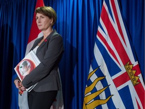 B.C. Representative for Children and Youth Mary Ellen Turpel-Lafond listens during a news conference after releasing a joint report with the B.C. Information and Privacy Commissioner about cyberbullying, in Vancouver, B.C., on Friday November 13, 2015. They are recommending the provincial government develop a cross-ministry strategy to prevent and mitigate the effects of cyberbullying and educate children and youth on digital citizenship.