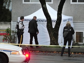 Burnaby RCMP on scene at 5996 Broadway St. in Burnaby, October 26, 2016.  At 1:00am Burnaby RCMP were called to the 5900 block of Broadway. Multiple people called 911 reporting hearing gunshots and then a car crash. When RCMP arrived they found a vehicle that had driven through the wall of a house. The driver of the vehicle had been shot. The vehicle crashed into the bedroom of a house right on top of a girl sleeping in her bed. It is reported that the girl was trapped under the vehicle and fire crews were called to rescue her. The shooting victim was transported to hospital with serious injuries.