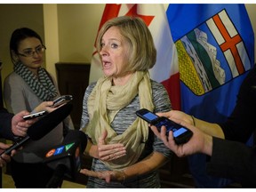 Alberta Premier Rachel Notley speaks to reporters at the McDougall Centre in Calgary, Alta., Tuesday, Oct. 4, 2016.