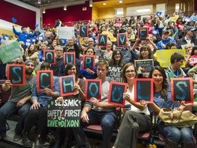 Parents and students fill Richmond Secondary to protest possible school closures.