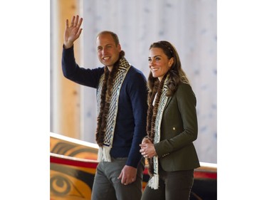 Prince William, Duke of Cambridge waves to well wishers while touring the carving shed with Kate, Duchess of Cambridge at the Haida Cultural Centre in Skidegate, BC, September, 30, 2016.