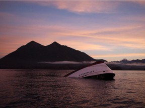 The Transportation Safety Board says a large, breaking wave hit a whale-watching vessel off British Columbia's coast, overturning the boat and dumping passengers and crew into the water in October 2015. The bow of the Leviathan II, a whale-watching boat owned by Jamie's Whaling Station carrying 24 passengers and three crew members, capsized on Oct. 25, 2015.
