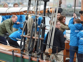 The Duke and Duchess of Cambridge help to raise the sails on a tallship, in Victoria on Saturday, October 1, 2016.