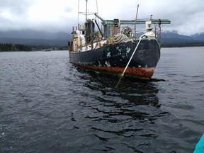 The Laurier II floats off the east coast of Vancouver Island as a decaying symbol of federal government inaction in dealing with the growing national problem of derelict vessels.