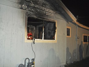 The exterior of a home where a toddler and his dog died in a fire, seen Saturday, Oct. 22, 2016. The toddler was found with his dog and teddy bear next to him, and authorities believe the dog tried to protect the boy in the fire that broke out around 11:30 p.m. Friday.