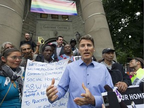 Vancouver Mayor Gregor Robertson speaks outside the Carnegie Centre after meeting with Downtown Eastside community groups and tent city residents about the city's lack of affordable housing in early August.