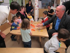 NDP  leader John Horgan and MLA Melanie Mark at the Terry Tayler Centre in Vancouver on Wednesday, October 19, 2016. Horgan announced that if elected, his government would bring in $10 per day childcare.