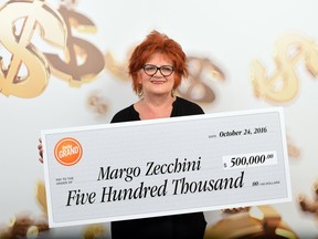 Margo Zecchini will go down in history as the first major Daily Grand Draw winner. Zecchini matched five out of five numbers, missing only the 'grand number,' to win the secondary prize of $25,000 a year for life on the first Daily draw on Oct. 20.