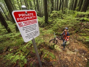 Province reporter John Colebourn rides the Lower Corkscrew trail on Mt. Seymour in North Vancouver on Oct. 19. Arlen Redekop/PNG files