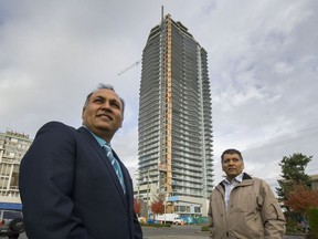 Satish Sharma (left), president of Marshall Mountain Homes, and Hari Sharma, managing broker for the project.