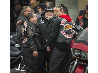 Friends and associates of Hell Angels' Bob Green arrive at Fraserview Hall for a memorial service in Vancouver.