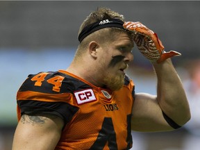 Adam Bighill of the B.C. Lions is appealing a $500 fine that the CFL slapped on him after he hit Edmonton Eskimos' quarterback Mike Reilly —who he considers a good friend — earlier this month at B.C. Place Stadium.