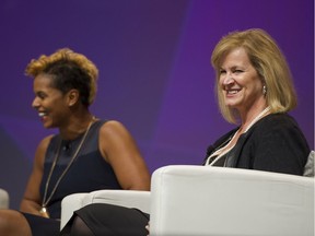 Janet Kennedy, President, Microsoft Canada (right) and Karina LeBlanc, Retired Canadian Goalkeeper, UNICEF Ambassador, share a laugh while on a panel titled The Power of Generations at the WE for She conference in Vancouver, BC, October, 14, 2016.