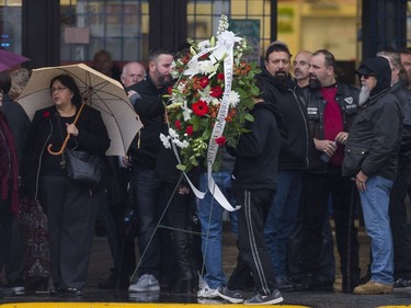Flowers for slain Hell Angels' Bob Green arrive at Fraserview Hall for a memorial service in Vancouver, BC, October, 29, 2016.