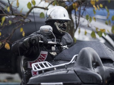 Friends and associates of Hell Angels' Bob Green arrive at Fraserview Hall for a memorial service in Vancouver.