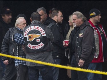 Friends and associates of Hell Angels' Bob Green arrive at Fraserview Hall for a memorial service in Vancouver.