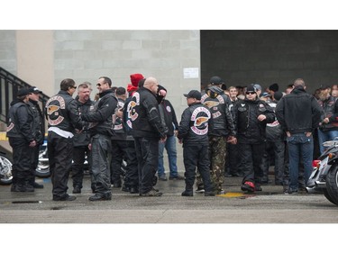 Friends and associates of Hell Angels' Bob Green arrive at Fraserview Hall for a memorial service in Vancouver.